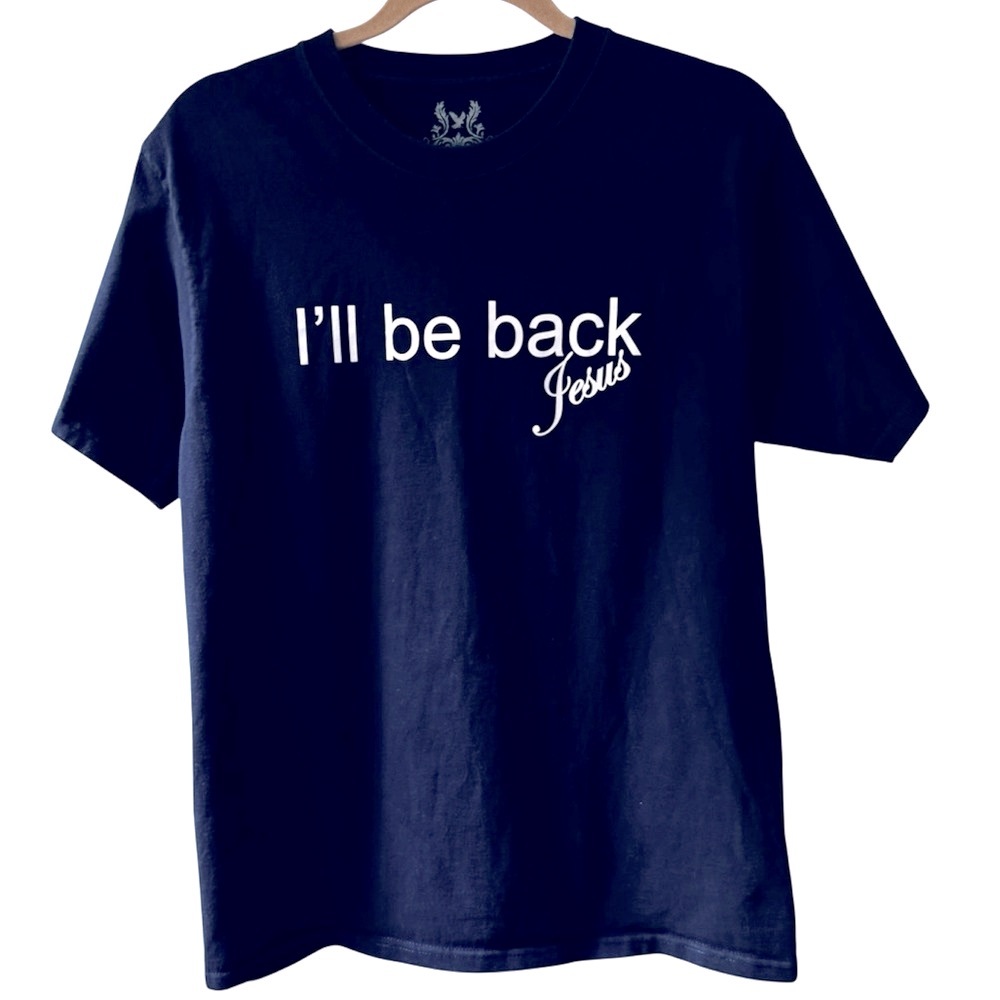Navy Blue “I’ll be back”, Jesus. Graphic T-Shirt, White Text.Reverse says “Jesus